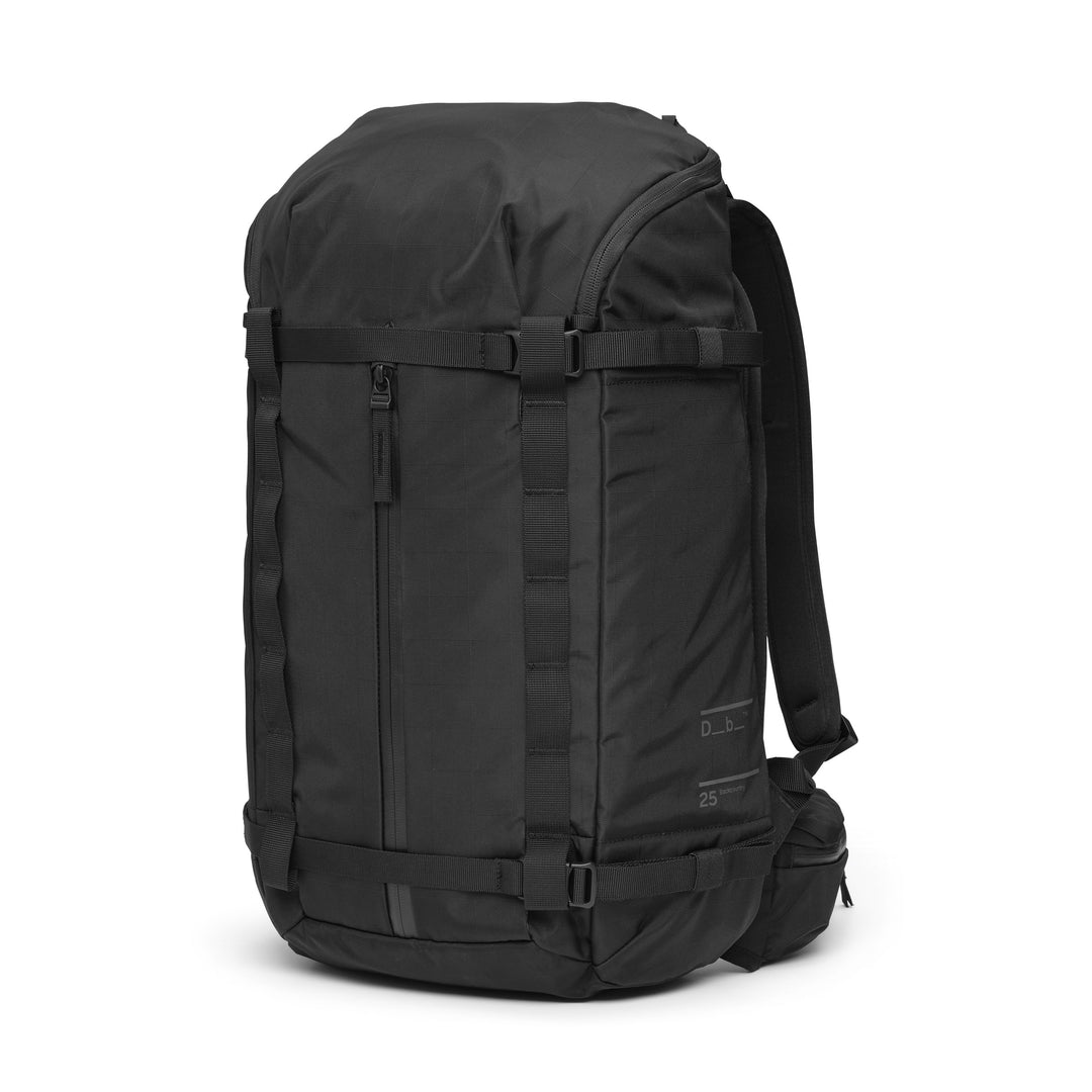 Backcountry Backpack 25L in Black, three-quarter view showing the padded shoulder straps and removable hip belt