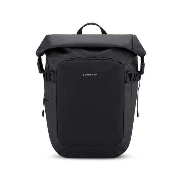 Kapten & Son Lisbon Small backpack in black — compact rolltop daypack with front zip pocket
