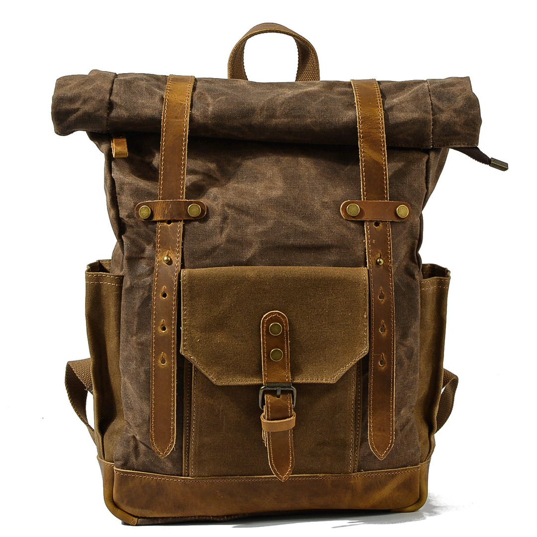 Roll top rucksack in deep red waxed canvas with crazy horse leather strap closures and brass buckles, Eiken Copenhague model