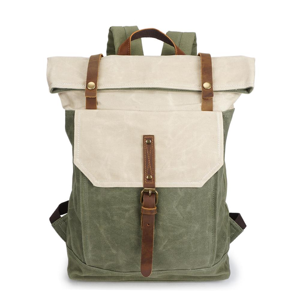 Vintage backpack in beige and green waxed canvas with crazy horse leather flap and antiqued brass buckles — Yukon